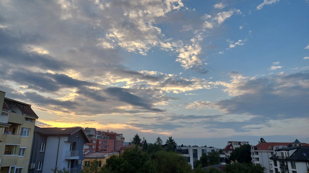 a photo of buildings from a window.